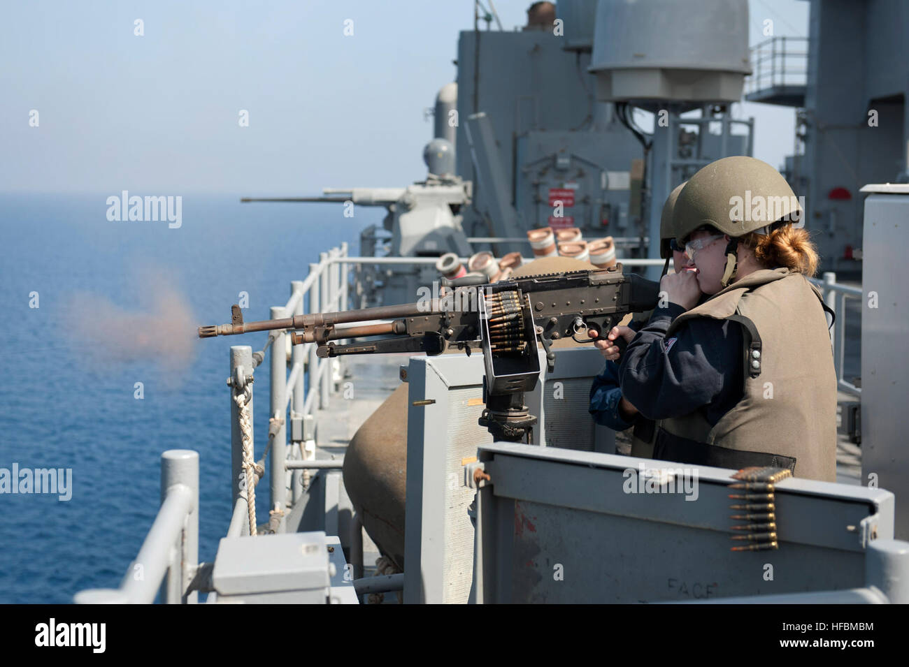 Crew aboard USS Pearl Harbor, LSD 52, conduct M240 machine gun ...