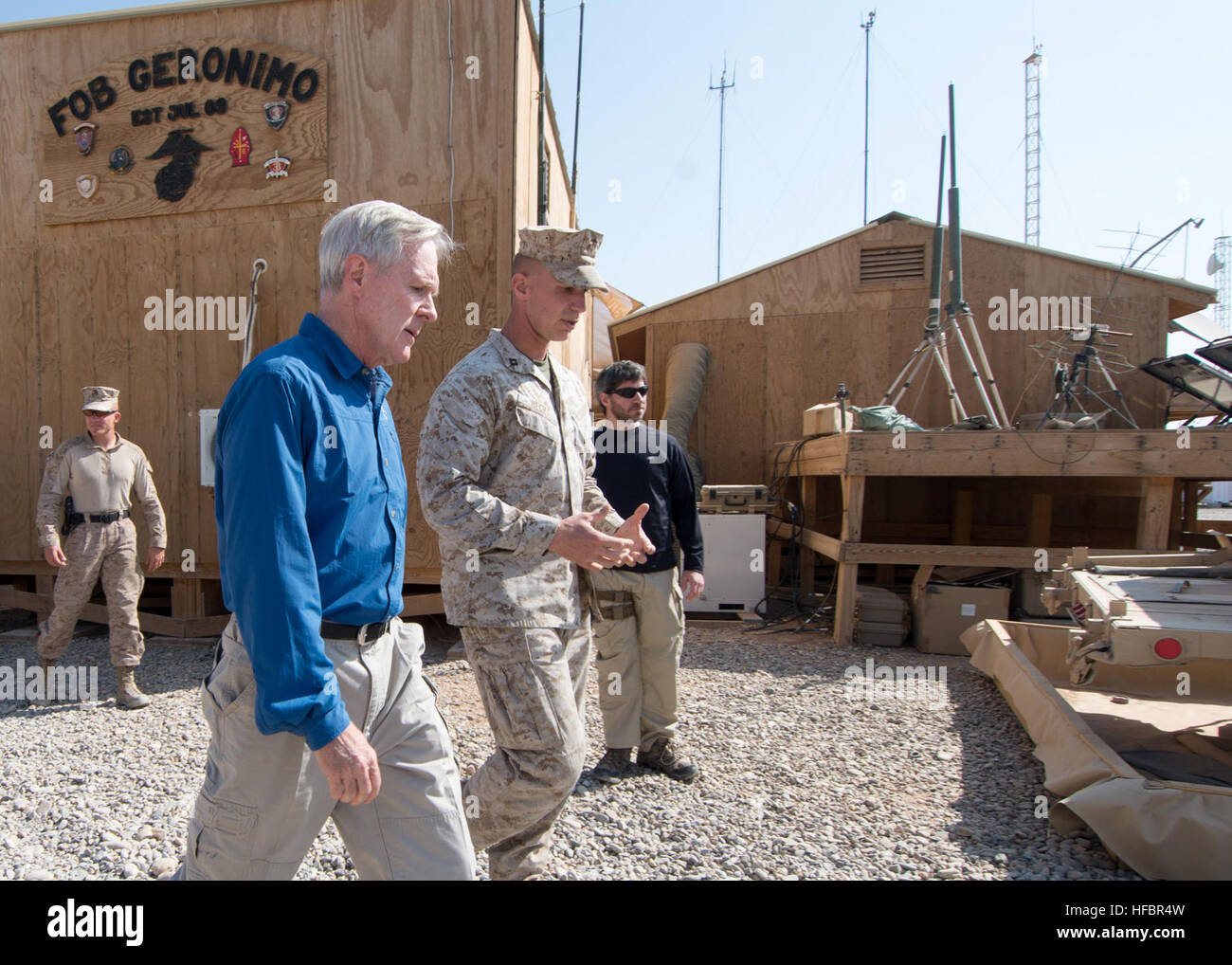 HELMAND PROVINCE, Afghanistan (Oct. 28, 2012) Secretary of the Navy (SECNAV) Ray Mabus observes expeditionary energy equipment at Forward Operating Base Geronimo, Helmand Province, Afghanistan. Mabus met with senior leaders, Sailors and Marines to discuss security in the region and to thank them for their service and sacrifice. America's Sailors are Warfighters, a fast and flexible force deployed worldwide. Join the conversation on social media using #warfighting. (U.S. Navy photo by Chief Mass Communication Specialist Sam Shavers/Released) 121028-N-AC887-005 Join the conversation http://www.f Stock Photo
