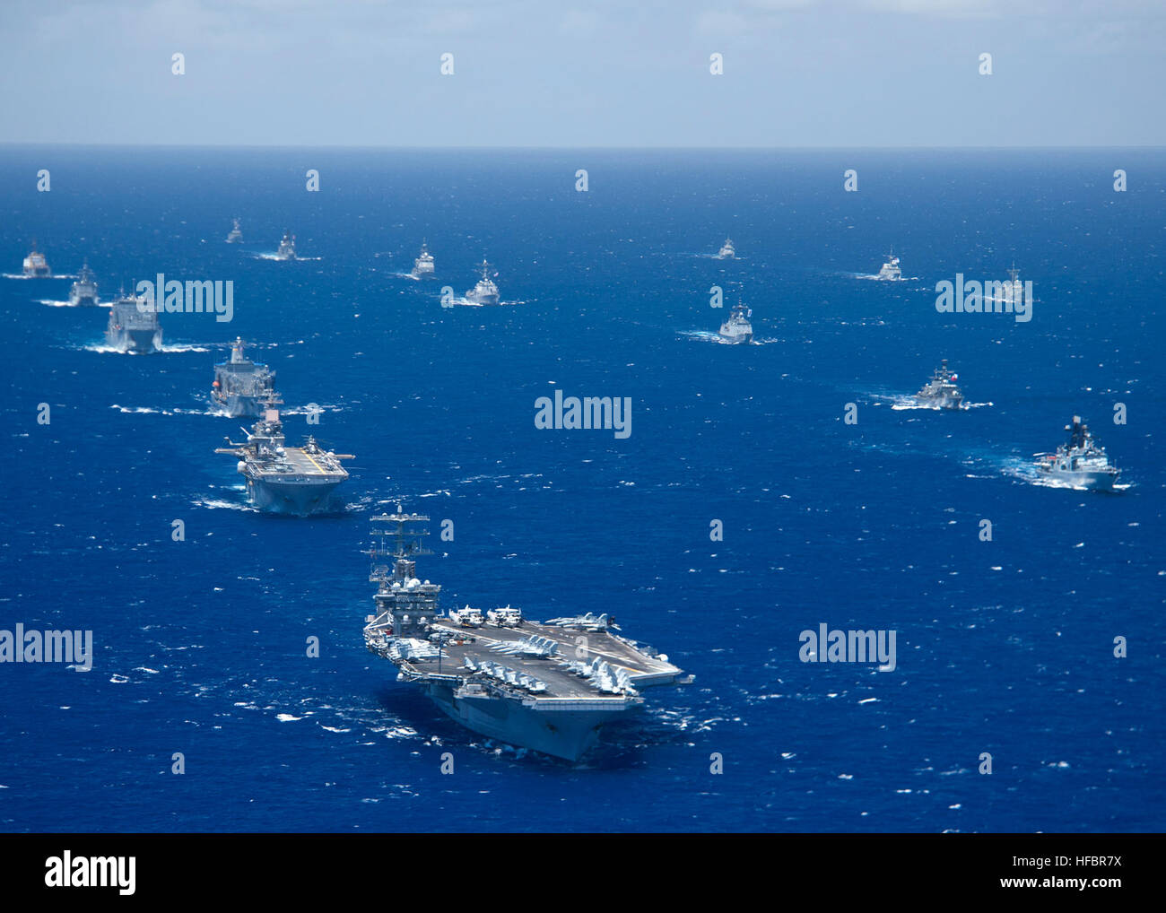 Ships and submarines from twenty-two nations operate in close formation ...