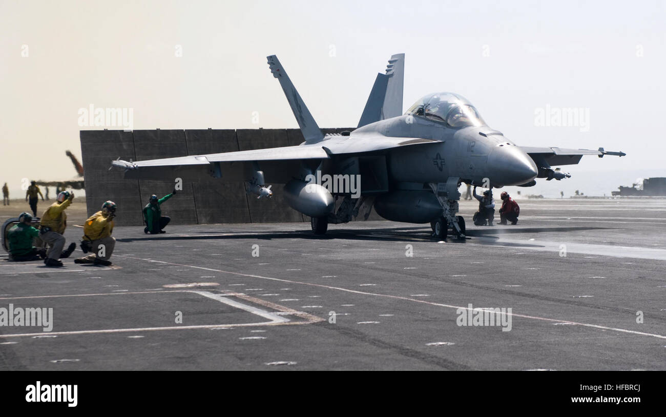 110223-N-7488A-346 ARABIAN SEA (Feb. 23, 2011) An F/A-18F Super Hornet assigned to Strike Fighter Squadron (VFA 22) prepares to launch from the Nimitz-class aircraft carrier USS Carl Vinson (CVN 70). The Carl Vinson Carrier Strike Group is deployed supporting maritime security operations and theater security cooperation efforts in the U.S. 5th Fleet area of responsibility. (U.S. Navy by Mass Communication Specialist Seaman Rosa A. Arzola/Released)  - Official U.S. Navy Imagery - Super Hornet prepares to launch. Stock Photo