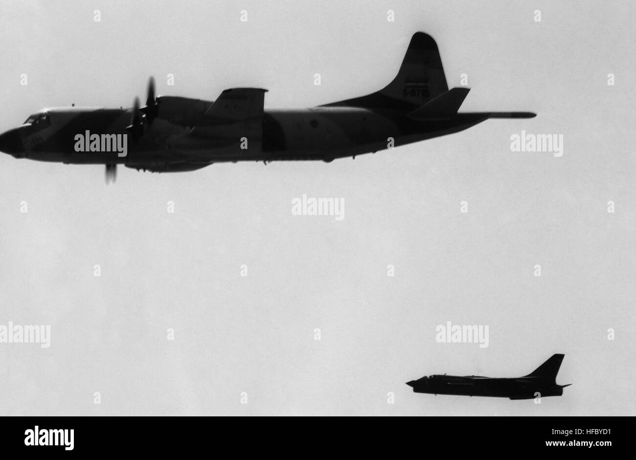 A French F-8 Crusader intercepts an Iranian P-3F Orion aircraft in an ...