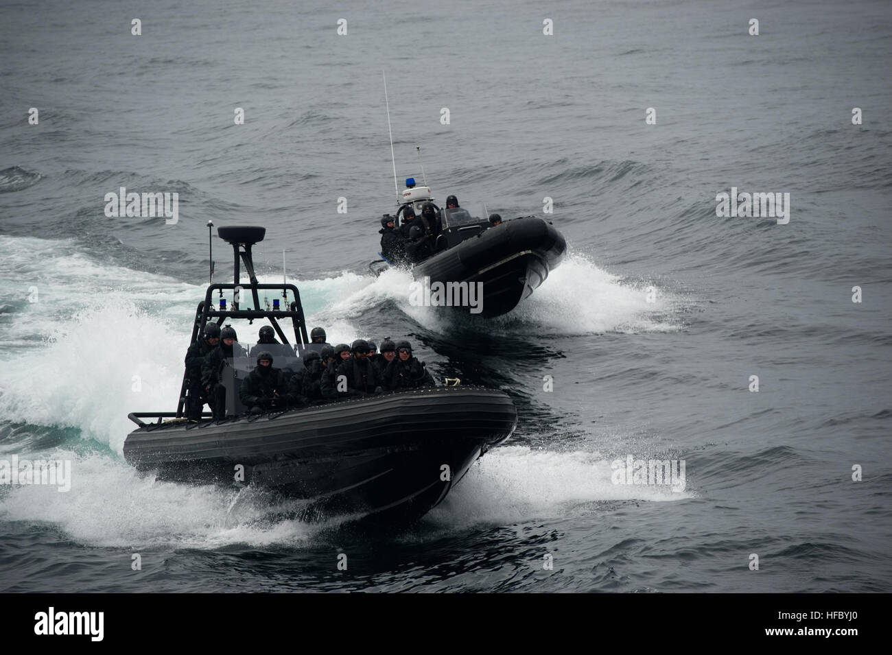 Royal Canadian Mounted Police assigned to a Marine Security Emergency Response Team head to board the survey research vessel Strait Hunter, simulating a migrant vessel during Exercise Frontier Sentinel 2012 May 7, 2012 at sea off Sydney, Nova Scotia. Exercise Frontier Sentinel is a combined interagency exercise involving Joint Task Force Atlantic, the U.S. Coast Guard and the U.S. Navy Fleet Forces Command. The exercise is designed to continue to develop and validate the existing plans, treaties and standard operation procedures for a bilateral response to maritime homeland defense and securit Stock Photo