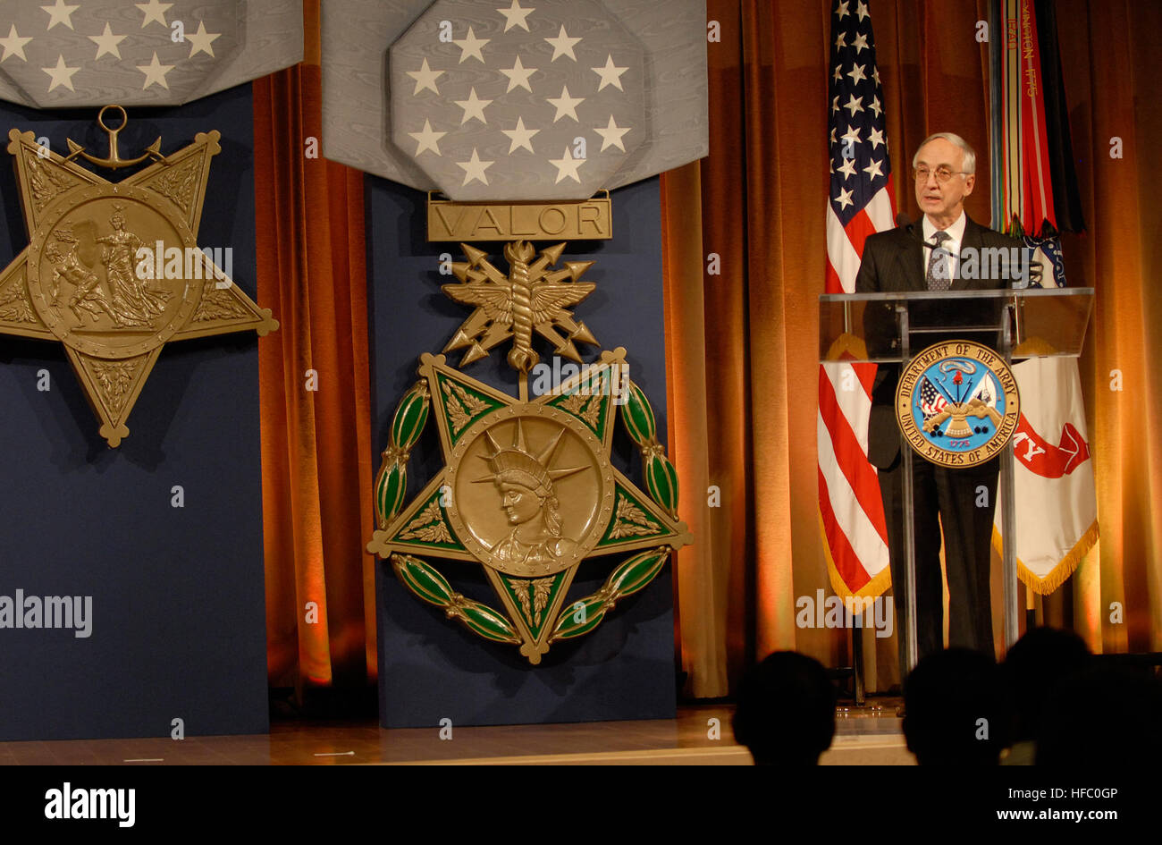 Deputy Secretary of Defense Gordon England speaks during a Hall of Heroes induction ceremony for Posthumous Medal of Honor recipient Army Private First Class Ross A. McGinnis, at the Pentagon, June 3, 2008, where McGinnis' parents Tom and Romayne accepted the award on their sons behalf.  McGinnis was killed in Baghdad on Dec. 4. 2006, when he used his body to cover a grenade that was thrown into the military vehicle he was riding in with four other soldiers.  Defense Dept. photo by U.S. Navy Petty Officer 2nd Class Molly A. Burgess. Gordon England speaks at the Hall of Heroes induction ceremon Stock Photo