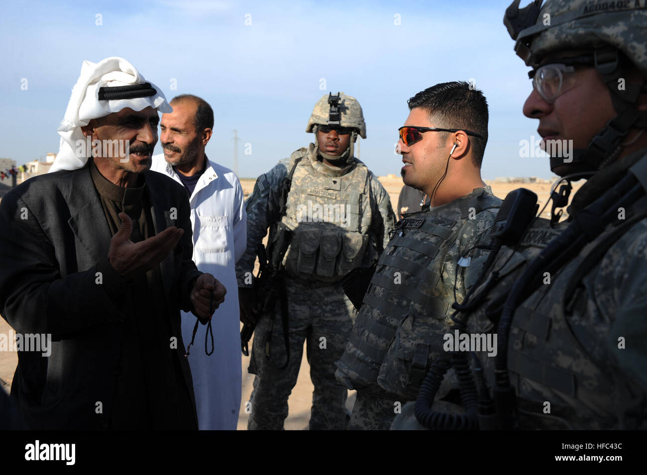 Ali Rashed Army Nayef Ahemed Mobshed, muktar of Rashedai, speaks to U.S. Army 1st Lt ...
