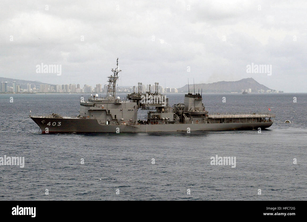 A port side view of the Japanese Maritime Self Defense Force CHIYODA CLASS: SUBMARINE DEPTO AND RESCUE SHIP, CHIHAYA (AS 403) moored about 1 mile south of Honolulu International Airport's Reef Runway, during recovery operations for the Japanese fishing vessel Ehime Maru. JS Chiyaha (AS-403) at Honolulu, -8 Nov. 2001 a Stock Photo