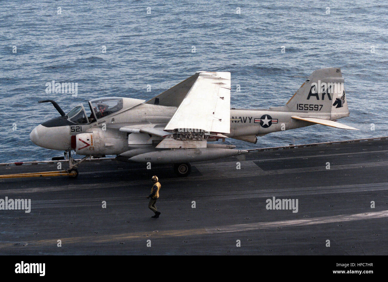 A KA-6D Intruder tanker aircraft from Attack Squadron 55 is towed along the  flight deck