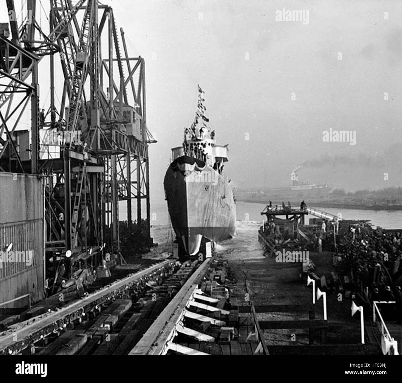 USS Farenholt (DD-491) slides down the building ways, during her launching at the Bethlehem Steel Company shipyard, Staten Island, New York, 19 November 1941.  U.S. Naval Historical Center Photograph. Launch of USS Farenholt (DD-491) in November 1941 Stock Photo