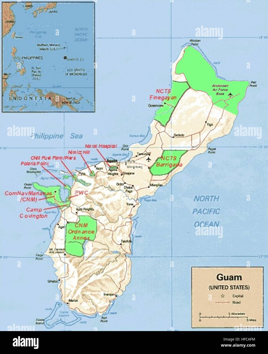 A map displays the locations of military installations on Guam, showing ...