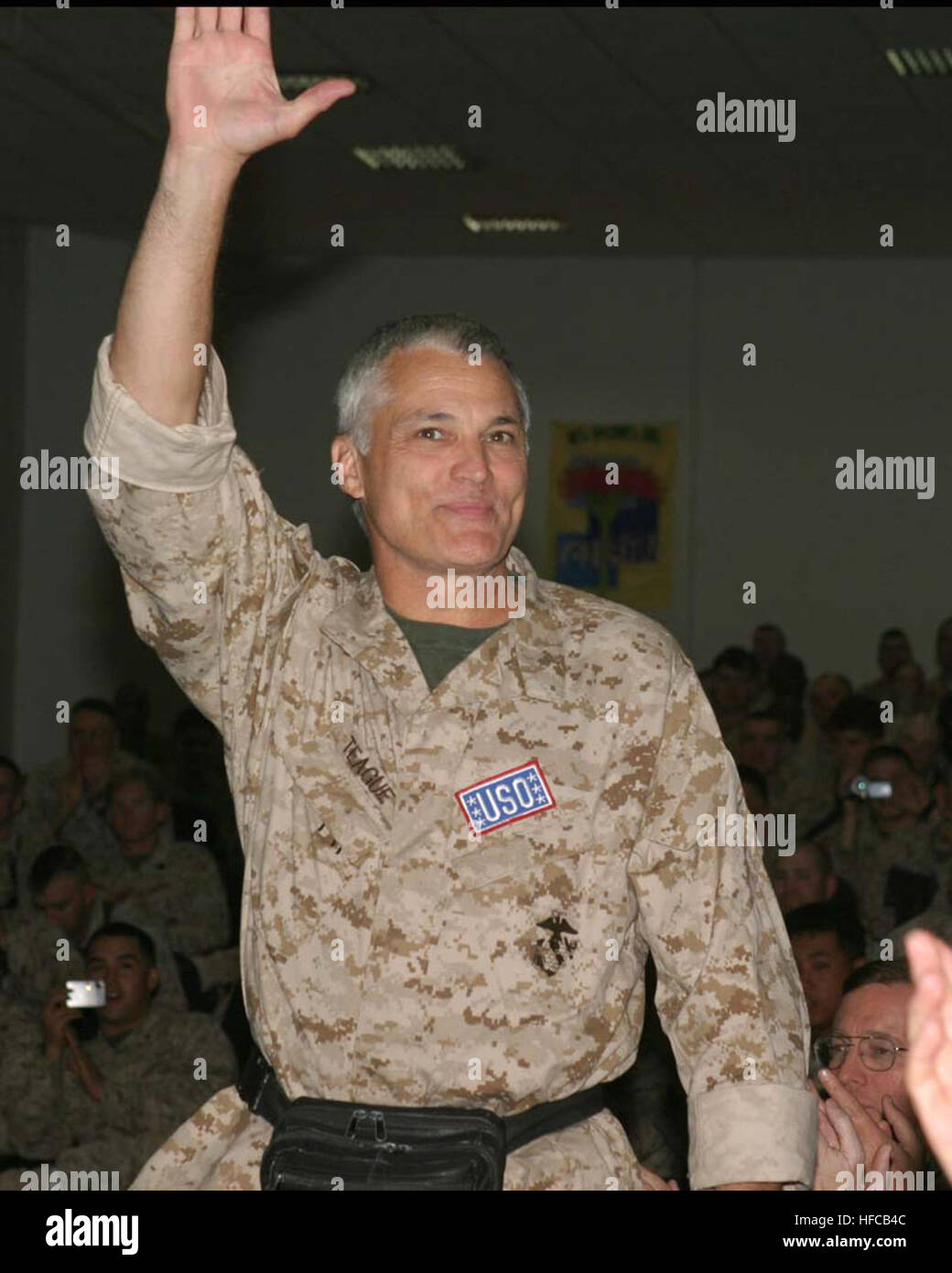 On November 1, 2006 actor Marshall Teaque is welcomed by Marines and other DOD personnell at the Chapel of Hope Camp Fallujah, Iraq.  I Marine Expeditionary Force (FWD) is deployed in support of Operation Iraqi Freedom in the Al Anbar Province of Iraq (MNF-W) to develop the Iraqi Security Forces, facilitate the developments of official rule of law through democratic government reforms, and continue the development of a market based economy centered on Iraqi reconstruction.(RELEASED)(RELEASED) Marshall R. Teague 061101-M-8741C-025 0U9NT Stock Photo