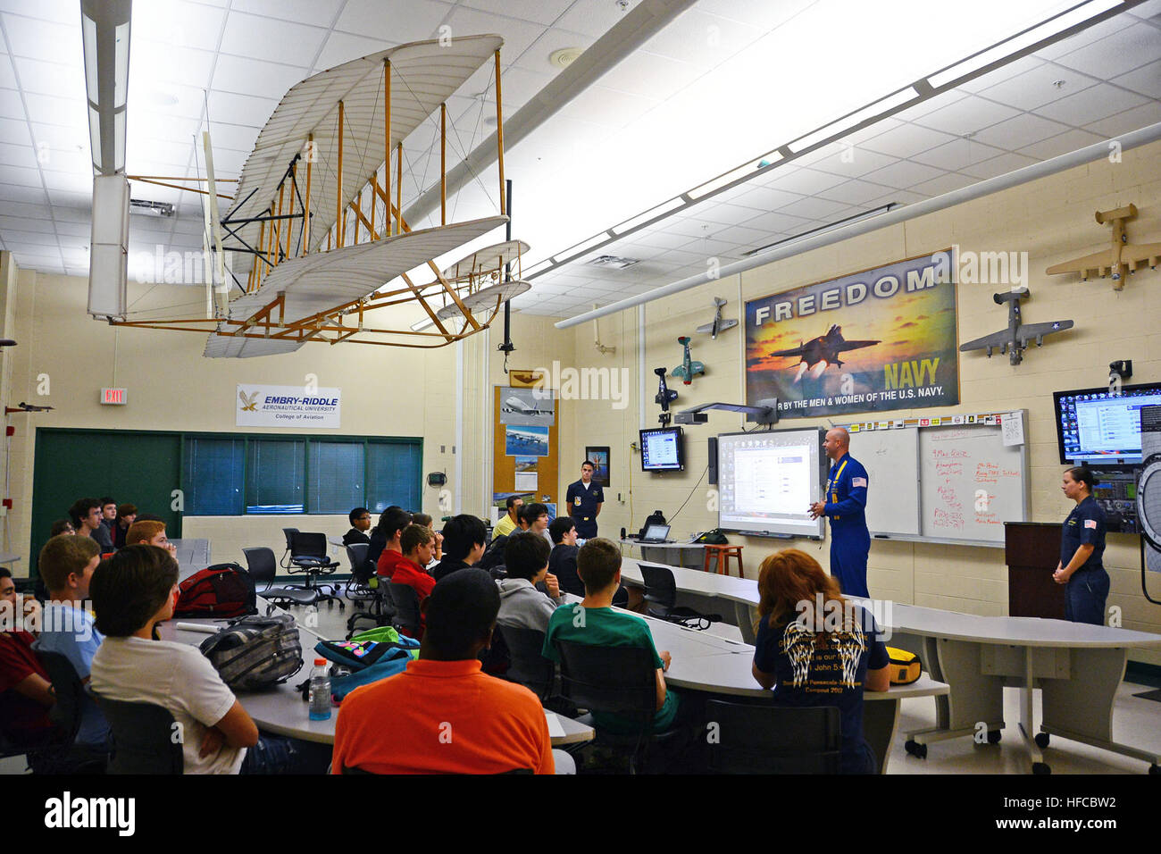 Aviation Structural Mechanic 1st Class Wes Harry (left), Marine Capt. A