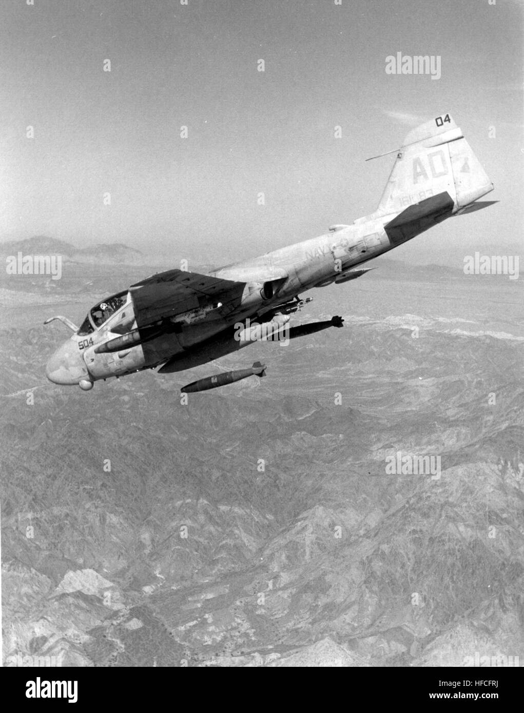 A-6E Intruder of VA-42 drops bombs over Chocolate Mountain range 1987 Stock Photo