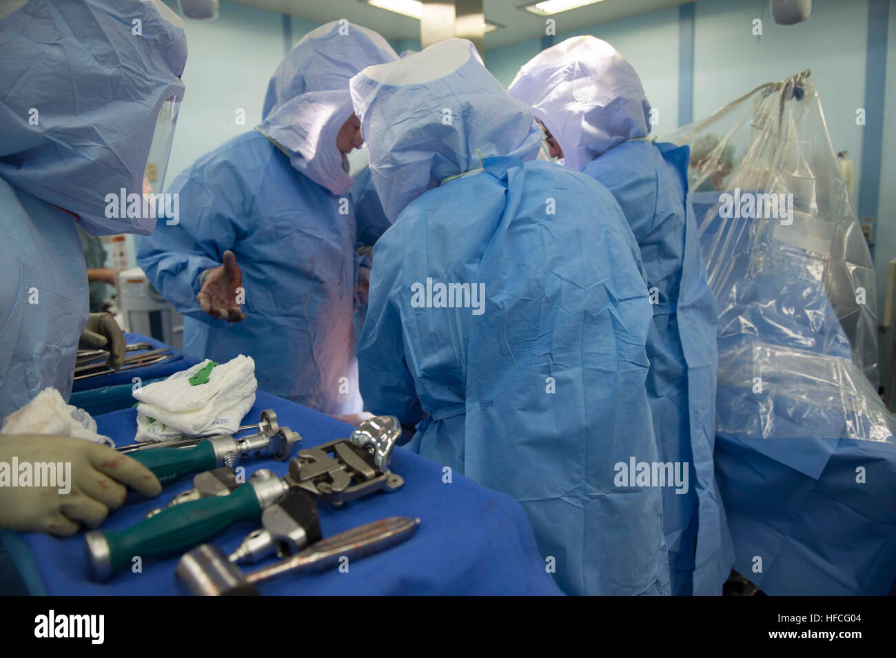 DA NANG, Vietnam (Aug. 18, 2015) Navy doctors from the hospital ship USNS Mercy (T-AH 19) perform a joint replacement surgery aboard the ship for a Vietnamese patient. Mercy is in Vietnam for its fourth mission port of Pacific Partnership 2015. Pacific Partnership is in its 10nth iteration and is the largest annual multilateral humanitarian assistance and disaster relief preparedness mission conducted in the Indo-Asia-Pacific region. While training for crisis conditions, Pacific Partnership missions to date have provided real world medical care to approximately 270,000 patients and veterinary  Stock Photo