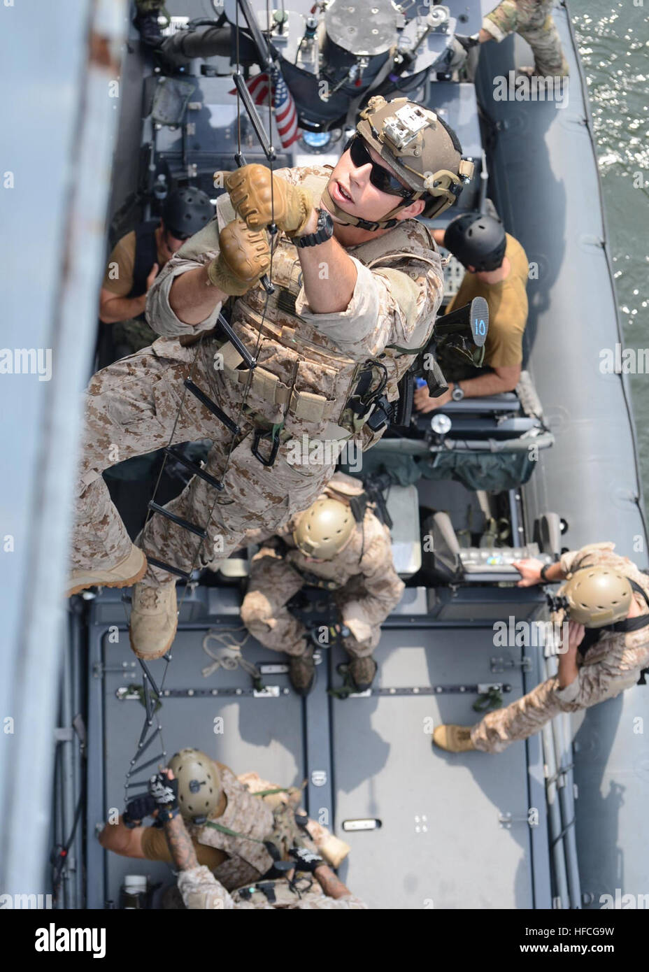 An East-Coast based U.S. Navy SEAL (Sea, Air, and Land) climbs a
