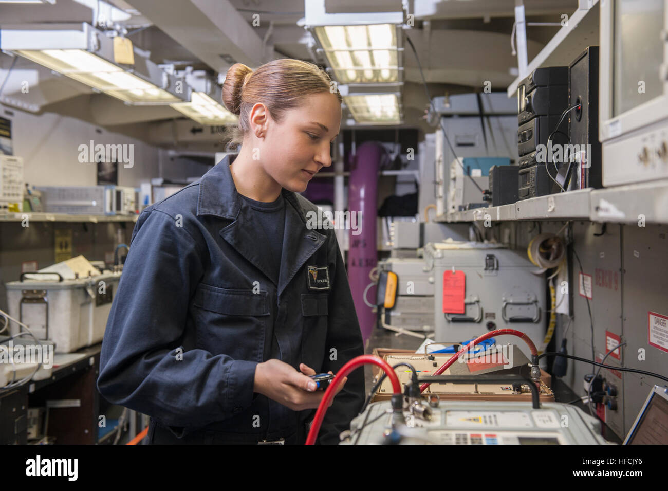 Aviation Electronics Technician Airman Hannah Sykes calibrates an air