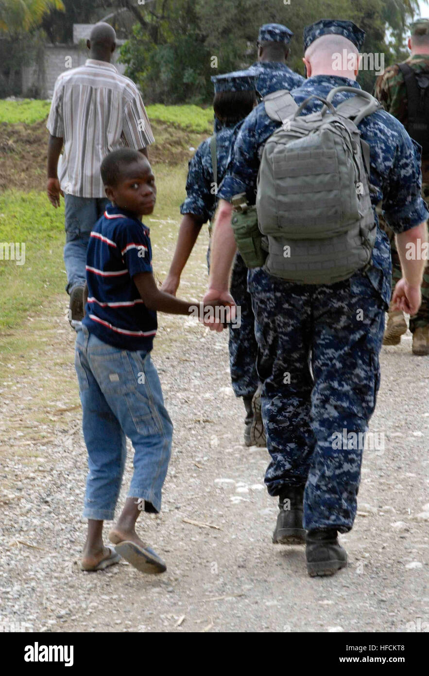 Chaplin Stephen Warne, assigned to the amphibious dock landing ship USS