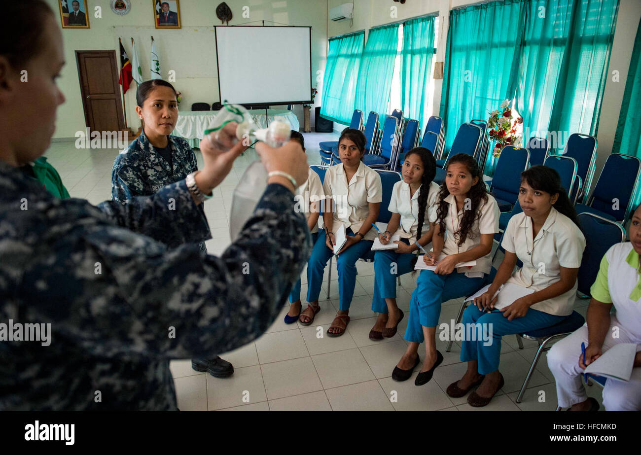 160610-N-QW941-061 DILI, Timor Leste (June 10, 2016) Hospital Corpsman 3rd Class Jana Sullivan (left), a native of Detroit, conducts basic life support training for Timorese students at the International Health Institute during Pacific Partnership 2016. This year marks the sixth time the mission visited Timor Leste since its first visit in 2006. Medical, engineering and various other personnel embarked aboard hospital ship USNS Mercy (T-AH 19) are working side-by-side with partner nation counterparts, exchanging ideas, building best practices and relationships to ensure preparedness should dis Stock Photo