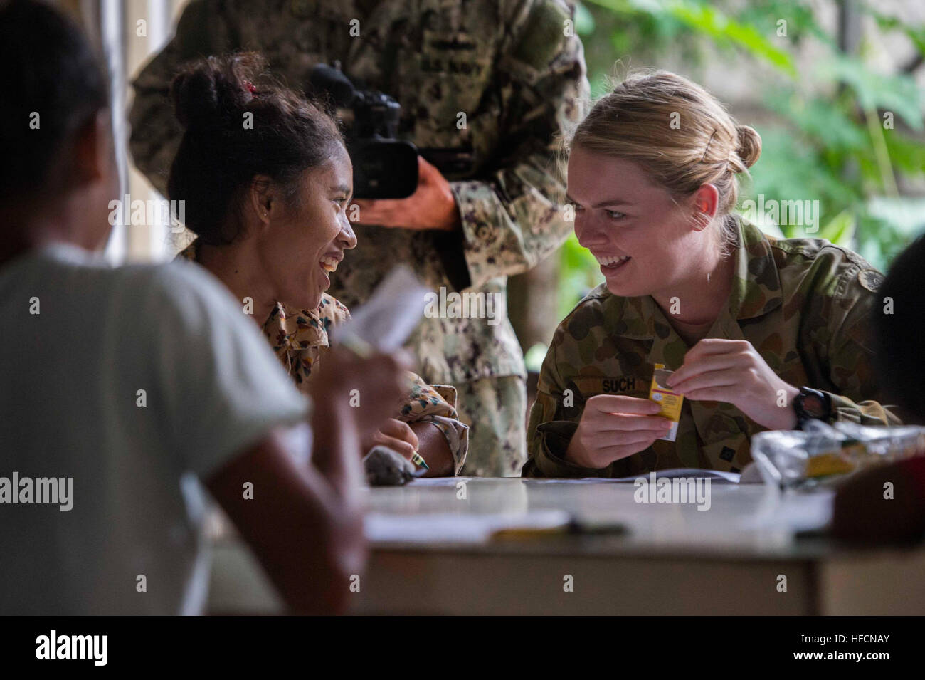 alien elleve Belønning Australian Army Capt. Nicole Such, right, plays with a Timorese resident at  the Santa Bakhita orphanage in Dili, East Timor, June 21, 2014, during a  visit in support of Pacific Partnership 2014.