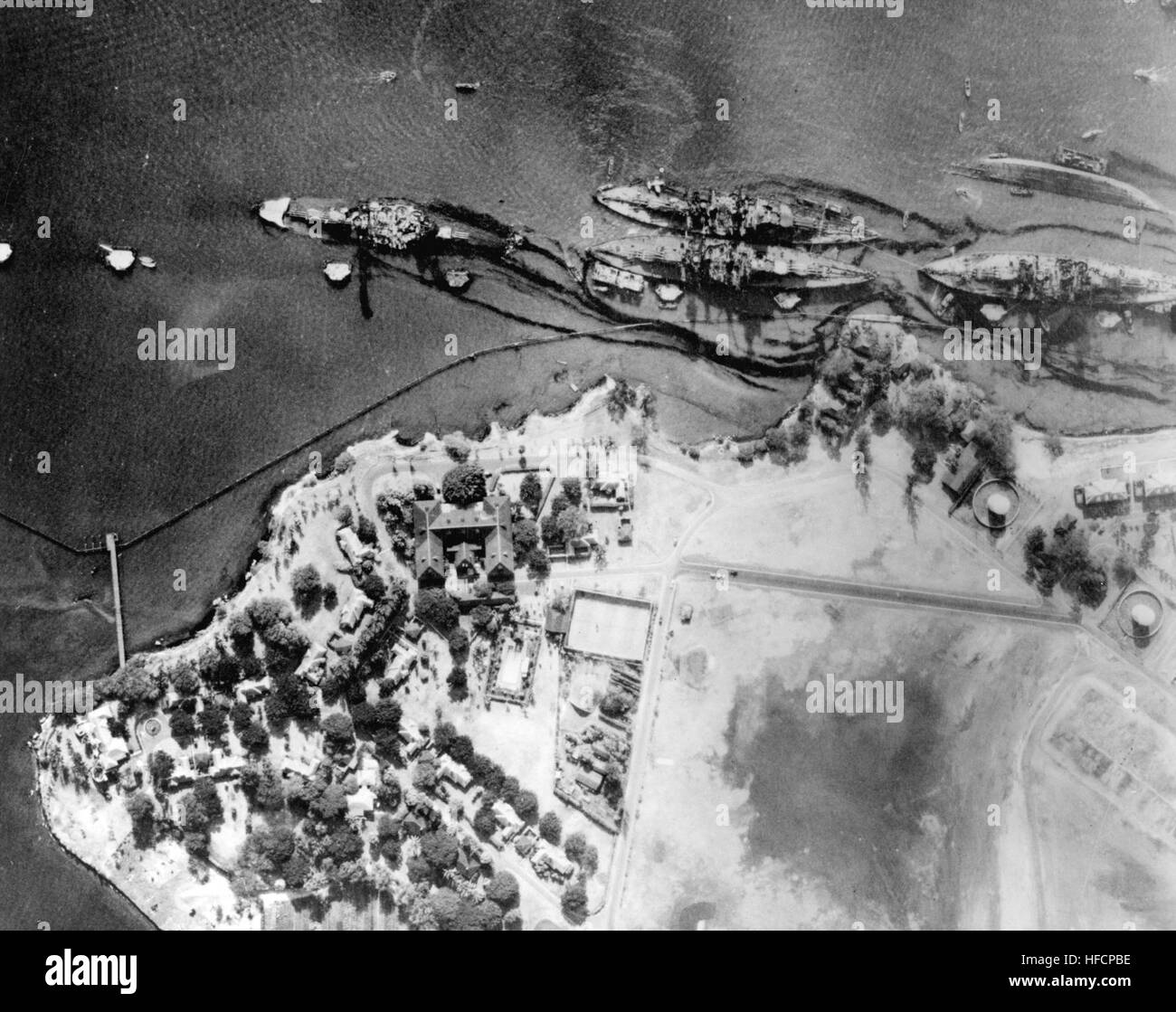 Pearl harbor Battleship row after the attack high level aerial view ...