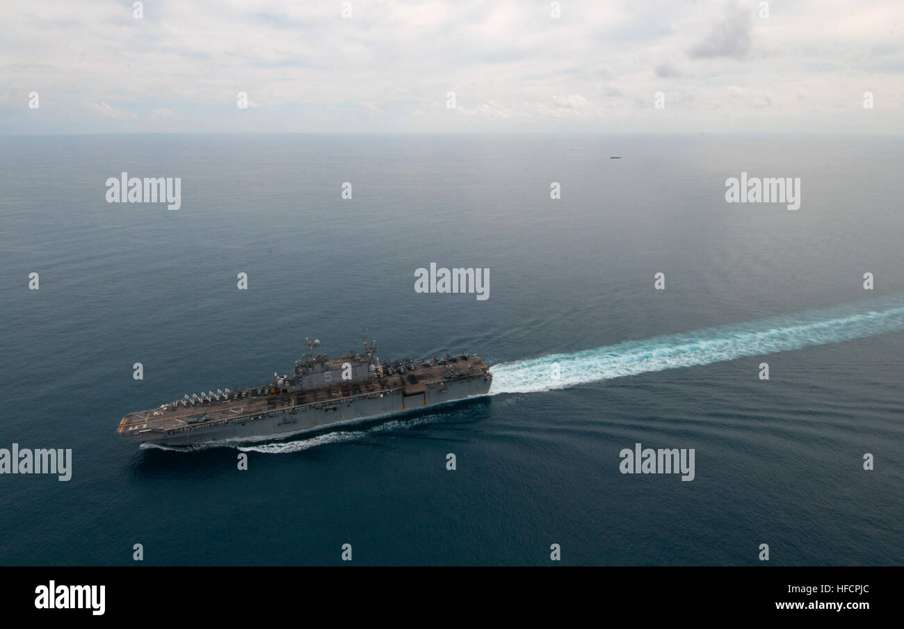 Sailors and Marines aboard amphibious assault ship USS Peleliu (LHA 5 ...