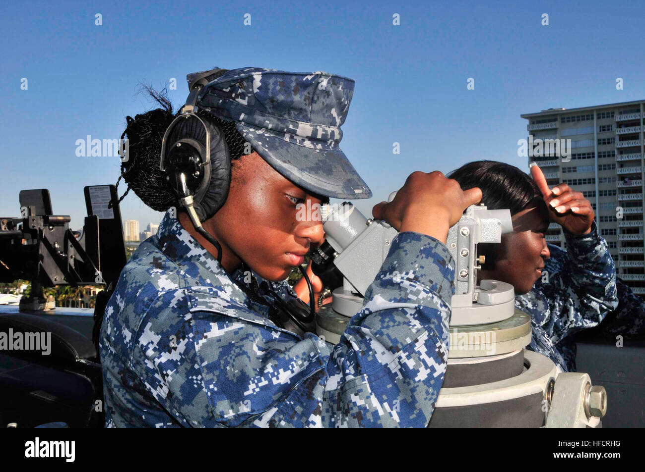 140505-N-YO707-070 PORT EVERGLADES, Fla. (May 5, 2014) Quartermaster Seaman Tia Mclellan reads bearing during sea and anchor evolution aboard the amphibious transport dock ship USS New York (LPD 21). New York is underway conducting training and exercises for a future deployment. (U.S. Navy photo by Mass Communication Specialist 2nd Class Cyrus Roson/ Released) Port Everglades Fleet Week2014 140505-N-YO707-070 Stock Photo