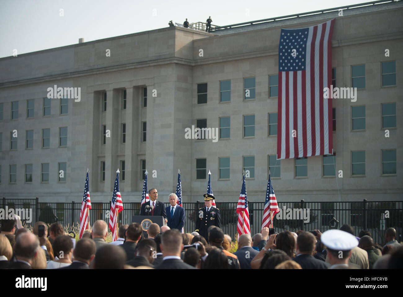 WASHINGTON (Sept. 11, 2013) President Barack Obama delivers remarks during a September 11, 2001 commemoration ceremony at the  Pentagon. With the president are Secretary of Defense Chuck Hagel and Chairman of the Joint Chiefs of Staff Gen. Martin E. Dempsey. (U.S. Navy photo by Mass Communication Specialist 1st Class Arif Patani/Released) 130911-N-PM781-002 Join the conversation http://www.navy.mil/viewGallery.asp http://www.facebook.com/USNavy http://www.twitter.com/USNavy http://navylive.dodlive.mil http://pinterest.com https://plus.google.com President Barack Obama speaks at the Pentagon. ( Stock Photo