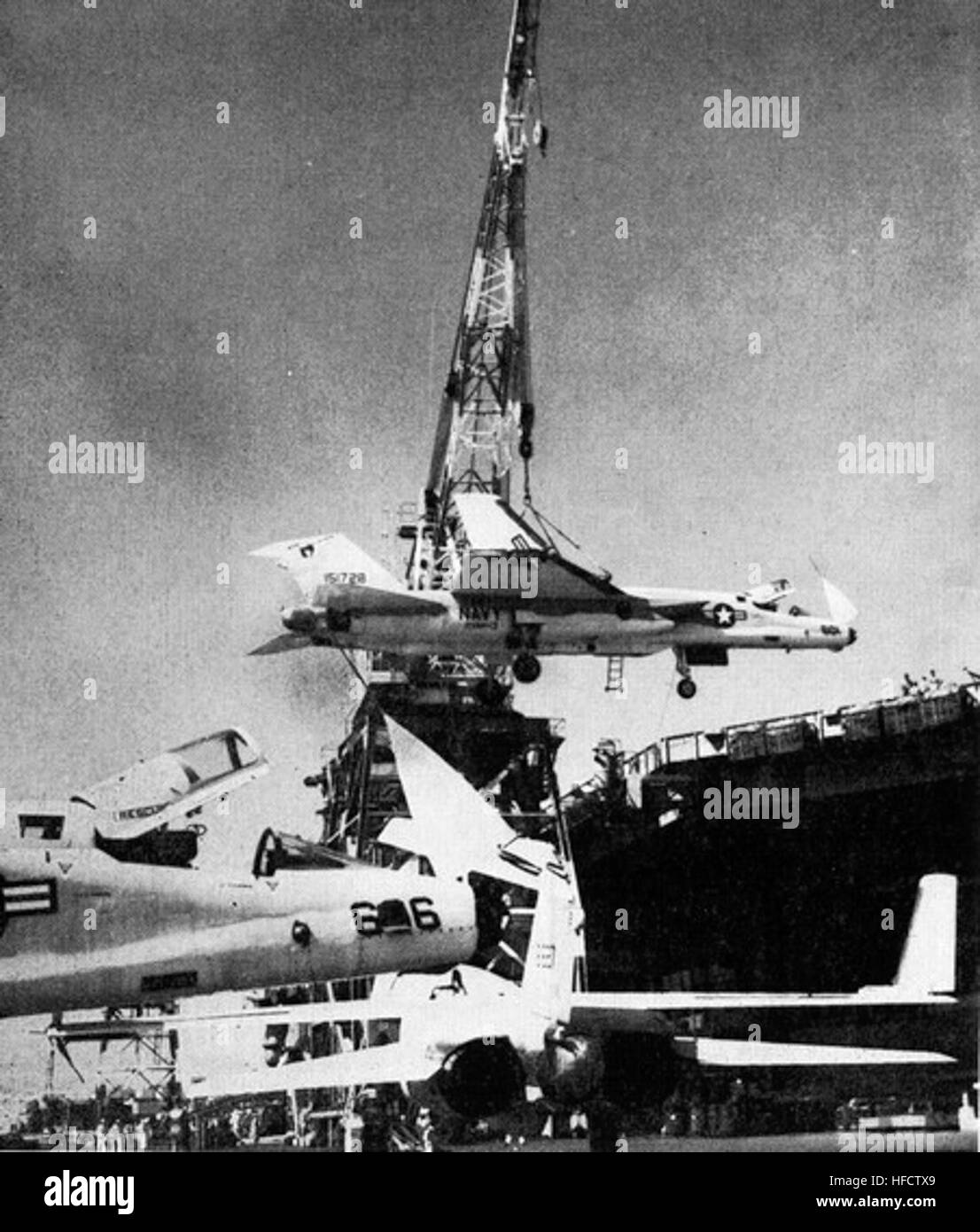 RA-5Cs RVAH-13 being hoisted on USS Kitty Hawk (CVA-63) 1965 Stock Photo