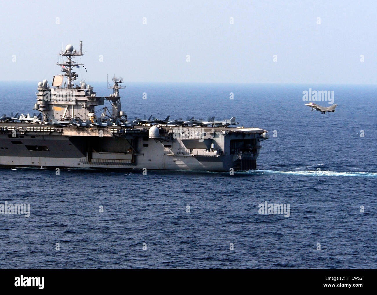 A French Rafale M aircraft prepares to land on USS Theodore Roosevelt ...