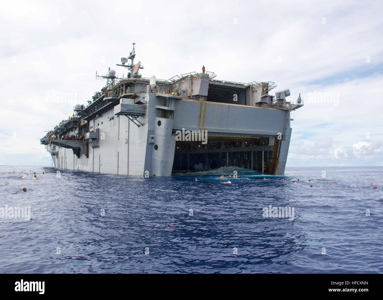 Sailors aboard the amphibious assault ship USS Peleliu (LHA 5) conduct ...