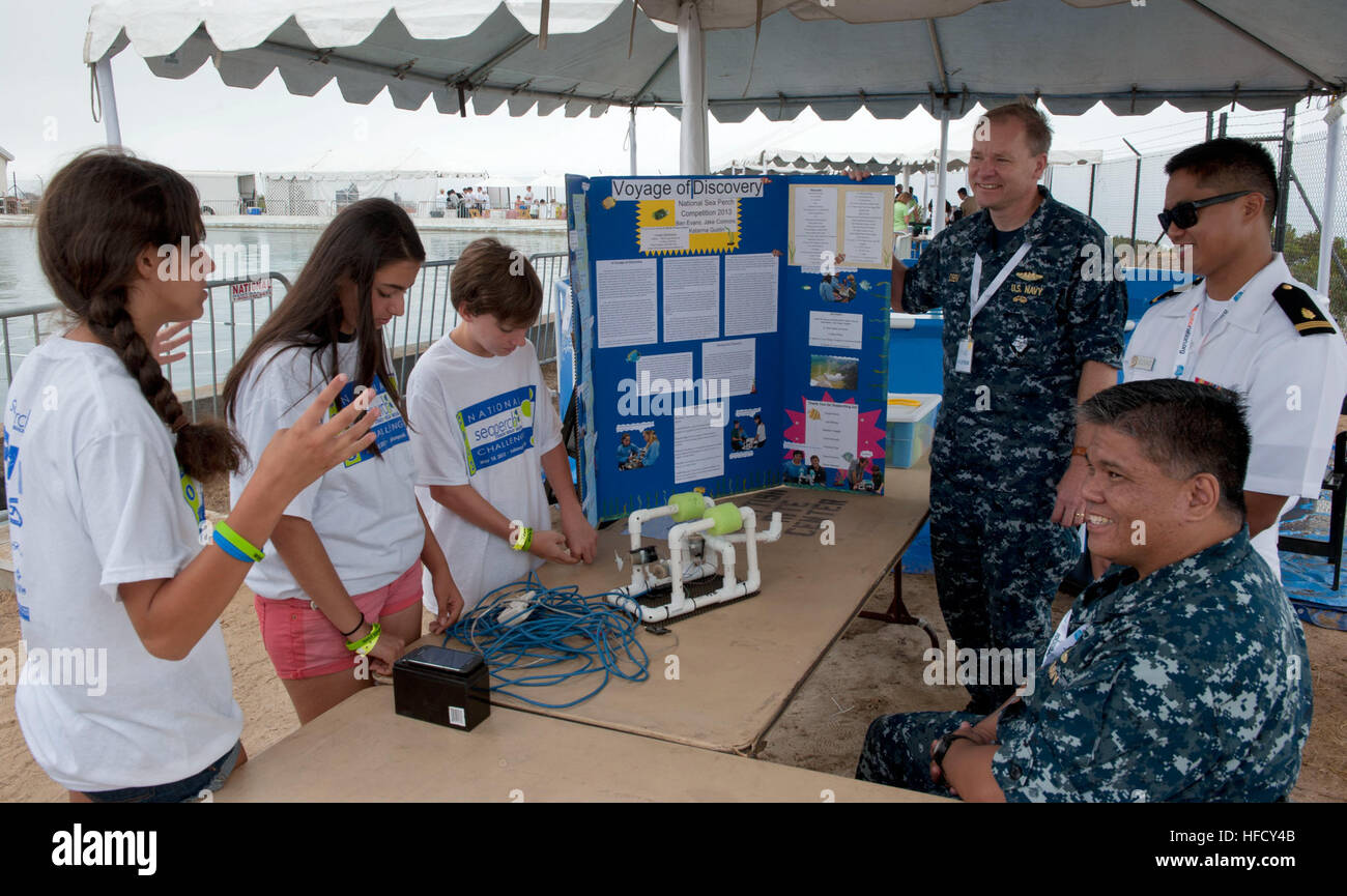 Middle school students present their robotic submarine during the SeaPerch Fun Challenge at the 16th International RoboSub Competition at the U.S. Navy research pool on Naval Base Point Loma, exploring engineering and science concepts underwater. Stock Photo