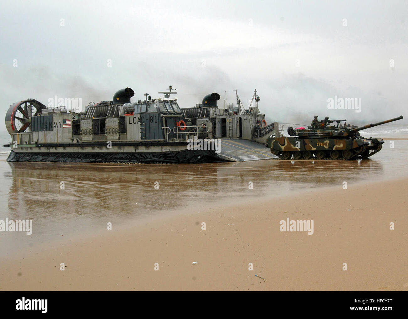 070329-L-6710M-012   SOUTH CHINA SEA (March 29, 2007) - A Republic of Korea tank exits a Landing Craft Air Cushion (LCAC) in preparation in support of Foal Eagle 07. Foal Eagle is an annually scheduled exercise involving forces from the U.S. and the Republic of Korea (ROK) to improve combat readiness through interoperability. The amphibious assault ship USS Tortuga and the Essex Amphibious Ready Group (ESXARG) are the Navy's only forward deployed multi-purpose amphibious assault ship and is the flagship for the Essex Amphibious Ready Group (ARG). U.S. Navy photo by Mass Communication Specialis Stock Photo