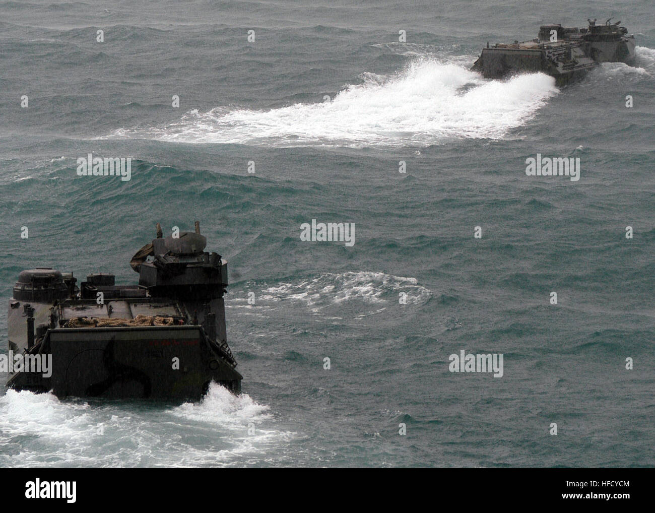 Royal Thai Navy AAV-7A1 amphibious assault vehicles, assigned to the medium landing ship HTMS Surin (LST 722), disembark from the dock landing ship USS Tortuga (LSD 46) during cooperation afloat and readiness training (CARAT) 2008, off the coast of Thailand June 15, 2008.  CARAT 2008 is an annual series of bilateral exercises involving the U.S. and Southeast Asian nations. (U.S. Navy photo by Mass Communication Specialist 2nd Class Leticia Fritzsche/Released) Royal Thai Navy AAV-7A1 AAVs disembark 080615-N-5831F-190 Stock Photo
