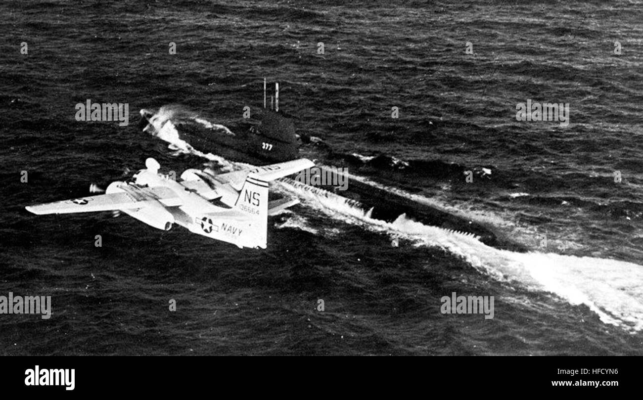 S-2F Tracker of VS-29 flying over USS Menhaden (SS-377) 1964 Stock Photo