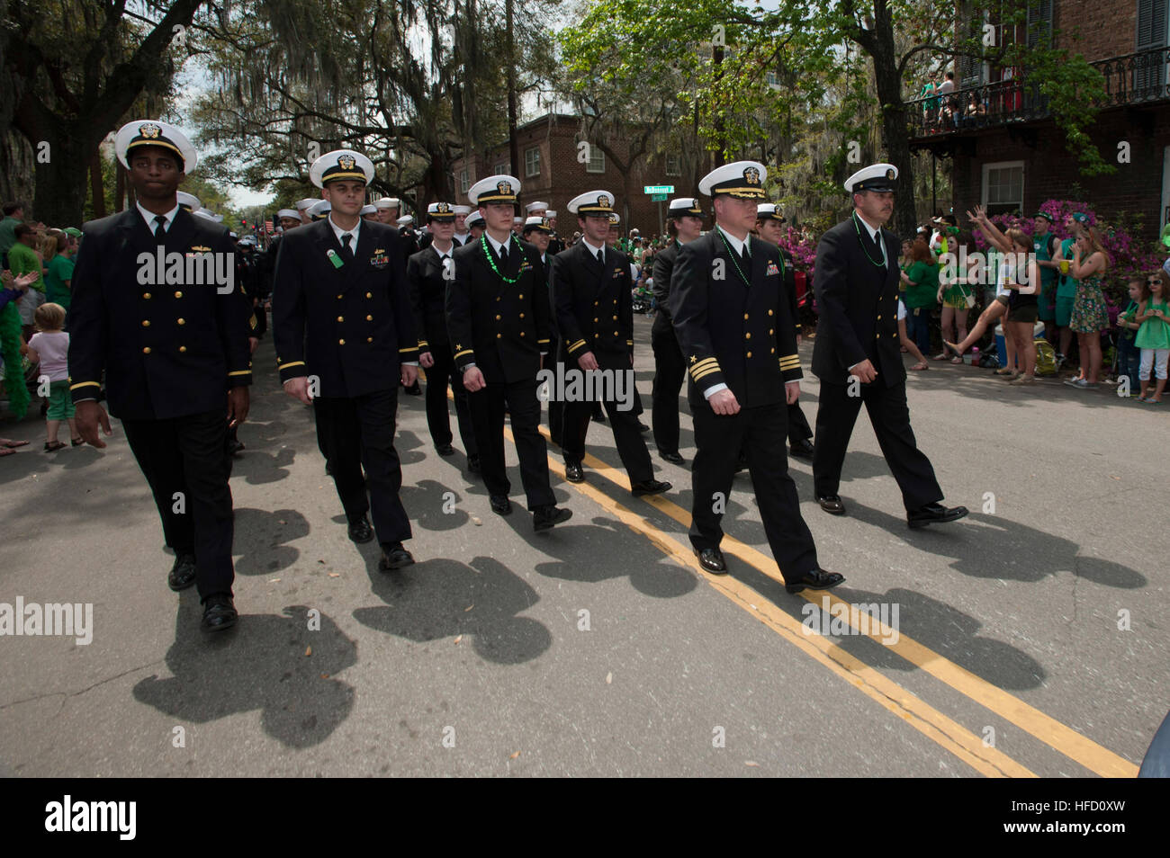 The crew of the amphibious dock landing ship USS Whidbey Island (LSD 41) march in the Savannah St. Patrick's Day Parade. Whidbey Island is in Savannah for a routine port visit from their homeport at Naval Amphibious Base Little Creek, Va. Sailors participate in Savannah's St. Patrick's Day parade 120317-N-FG395-068 Stock Photo