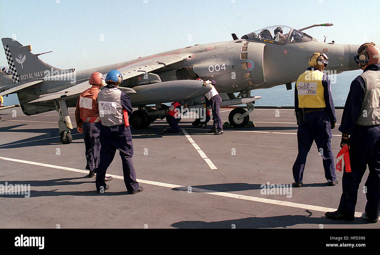 british-royal-navy-flight-deck-personnel-prepare-a-royal-navy-fa-2-harrier-jumpjet-for-a-mission