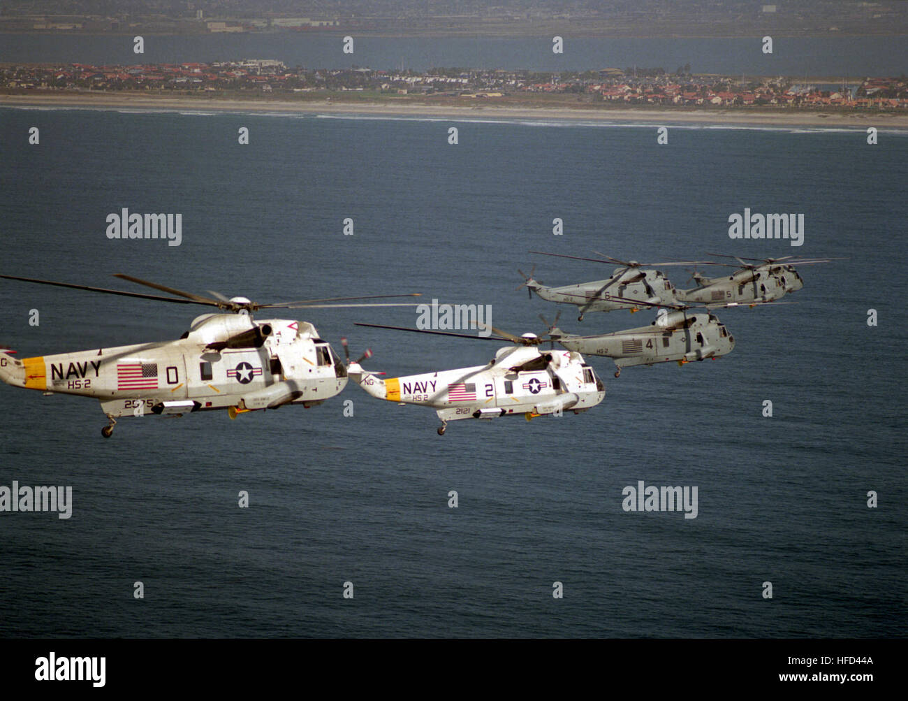 A right side view of six SH-3H Sea King helicopters from Helicopter ...