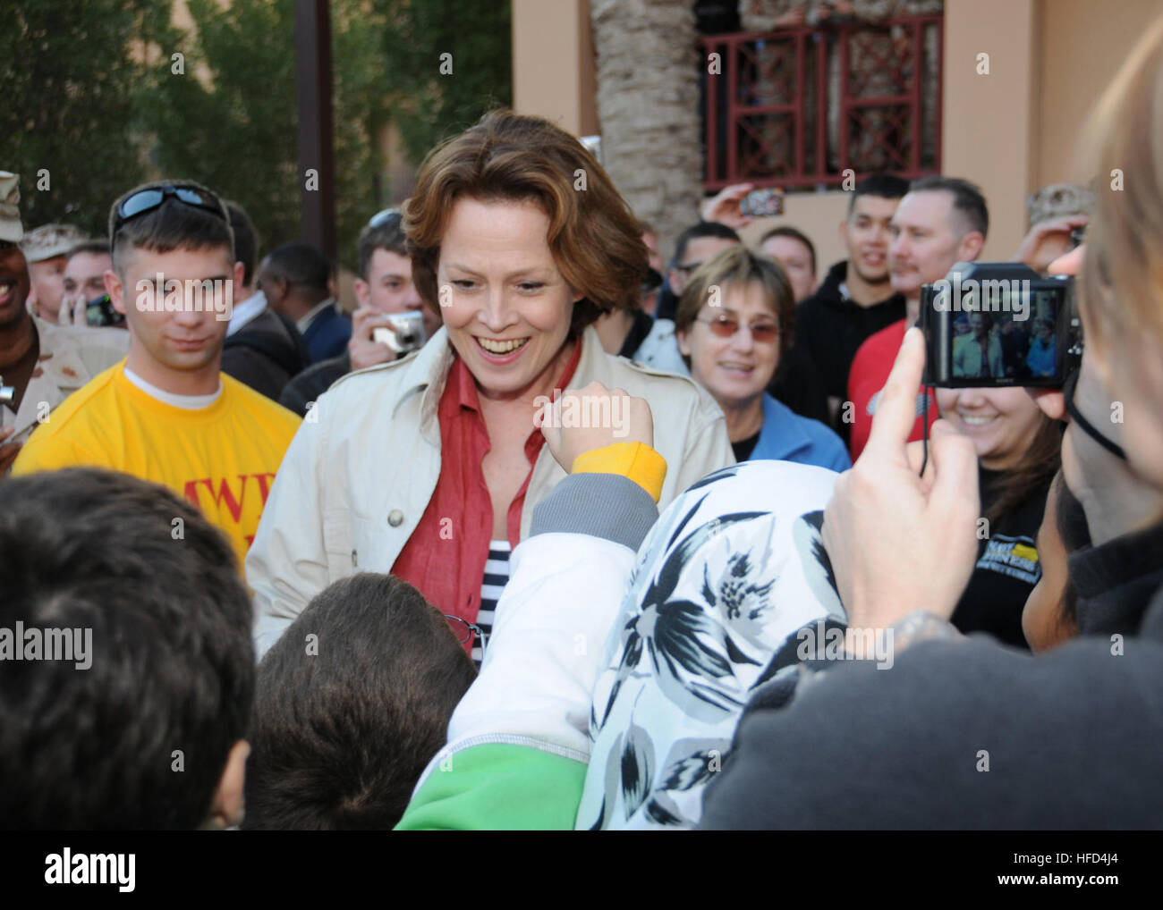 Sigourney Weaver, an actor in the film ?Avatar,? meets with U.S. Sailors and their families at a Navy Entertainment-sponsored meet and greet event held aboard Naval Support Activity Bahrain Jan. 28, 2010, in Manama, Bahrain. The stop was one of several planned in the U.S. 5th fleet area of operations, which included ?Avatar? actors Stephen Lang,  Michelle Rodriguez and director James Cameron. The Navy Entertainment program is among the many programs that comprise the Navy Morale, Welfare and Recreation program, which supports mission readiness, personnel retention and improves overall quality  Stock Photo