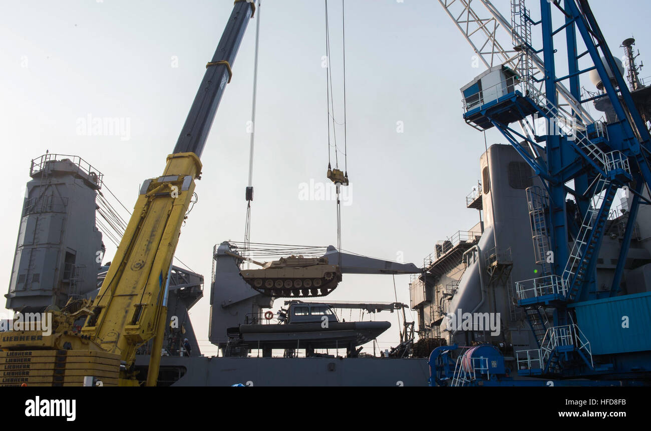 160314-N-RM689-034  GWANGYANG, Republic of Korea (March 14, 2016)- A M1A1 Abram tank attached to  Delta Company 1st Tank Battalion, 1st U.S. Marine Division is lifted by two  pier side cranes onto amphibious dock landing ship USS Ashland (LSD 48) to  prepare for the Assault Follow-On Echelon (AFOE) portion of Exercise Ssang  Yong 2016 (SY16). Ashland is assigned to the Bonhomme Richard Expeditionary  Strike Group and is participating in SY16, a biennial combined amphibious  exercise conducted by forward-deployed U.S. forces with the Republic of  Korea Navy and Marine Corps, Australian Army and Stock Photo