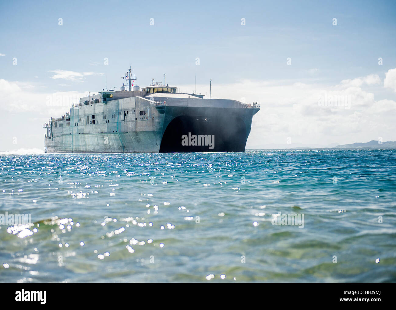 U.S. Navy and Royal Barbados Defense Force personnel operate a rigid ...