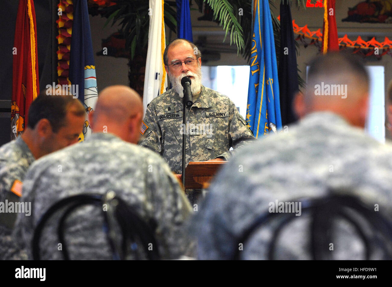 Army Col. Jacob Goldstein, a Jewish chaplain visiting Joint Task Force Guantanamo, offers blessing and guidance during a prayer breakfast at the Seaside Galley, Nov. 17, 2008. JTF Chaplains held a prayer breakfast offering faith guidance and guest speakers. JTF Guantanamo conducts safe, humane, legal and transparent care and custody of detained enemy combatants, including those convicted by military commission and those ordered released. The JTF conducts intelligence collection, analysis and dissemination for the protection of detainees and personnel working in JTF Guantanamo facilities and in Stock Photo
