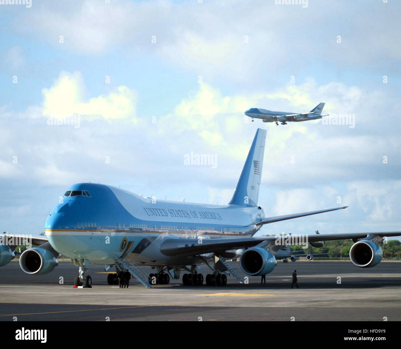 Air Force One lands at Hickam Air Force Base AFB with US President George W. Bush on board for his first visit to Hawaii while holding office. The two Boeing VC 25A Air