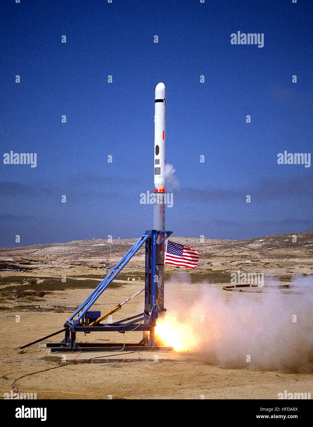 A Tactical Tomahawk, the next generation of Tomahawk Cruise Missile, is launched from a vertical ground launcher during a contractor test and evaluation at Point Mugu, California (CA). Tomahawk Cruise Missile is launched (2002) Stock Photo