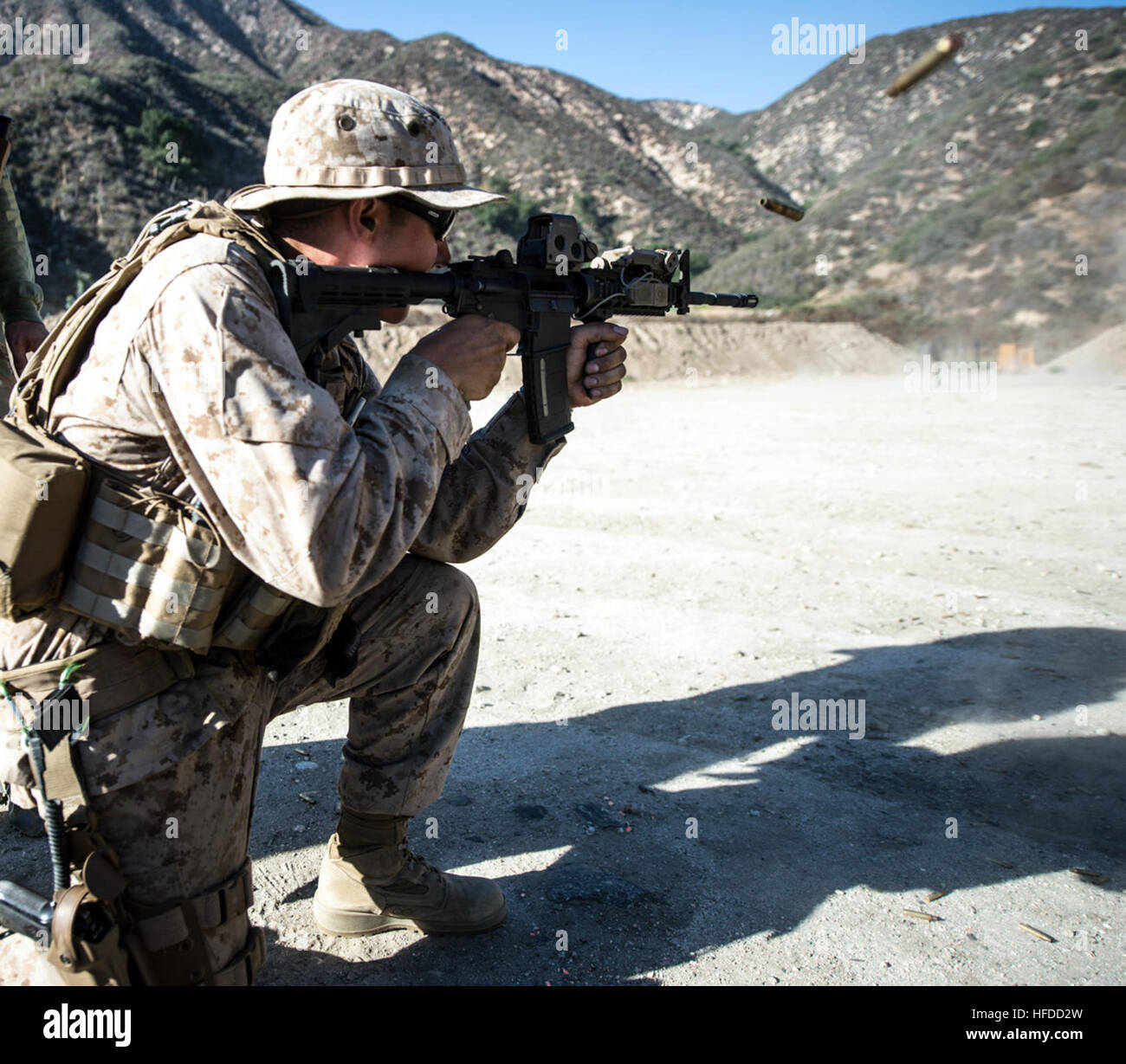 A Hospitalman fires an M4 rifle during a live-fire drill as part of ...