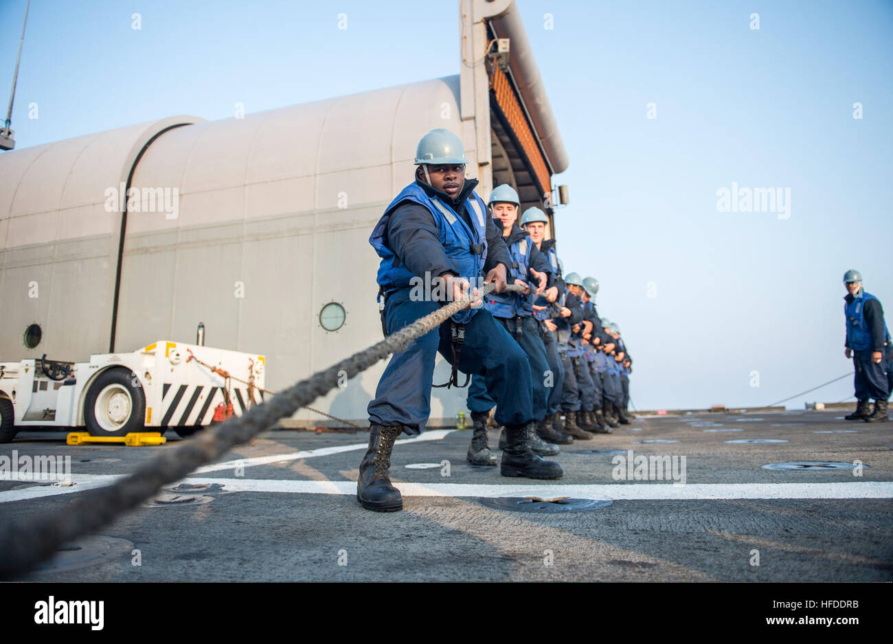 U.S. Sailors assigned to the amphibious transport dock ship USS Denver (LPD 9) tow a line while conducting a replenishment at sea with the fleet replenishment oiler USNS Rappahannock (T-AO 204) in the East China Sea March 27, 2014. The Denver was part of the Bonhomme Richard Amphibious Ready Group and was participating in exercise Ssang Yong 14, a combined U.S.-South Korean combat readiness and joint/combined interoperability exercise designed to advance South Korean command and control capabilities through amphibious operations. (U.S. Navy photo by Mass Communication Specialist 3rd Class Todd Stock Photo