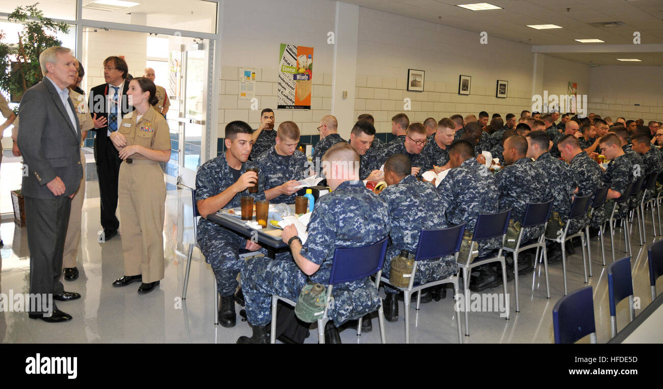 U.S. Secretary of the Navy Ray Mabus, left, tours the galley in the USS ...