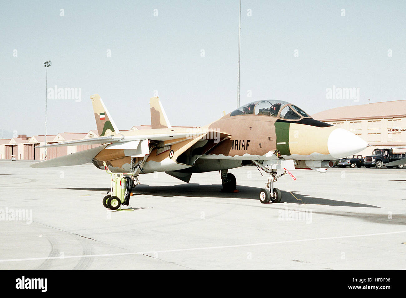 An F-14A Tomcat fighter aircraft from the U.S. Navy 'Top Gun' Fighter Weapons School, San Diego, painted like an Iranian fighter for adversary training, makes a visit to the U.S. Air Force Fighter Weapons School. Exact Date Shot Unknown US F-14 painted like an Iranian fighter Stock Photo