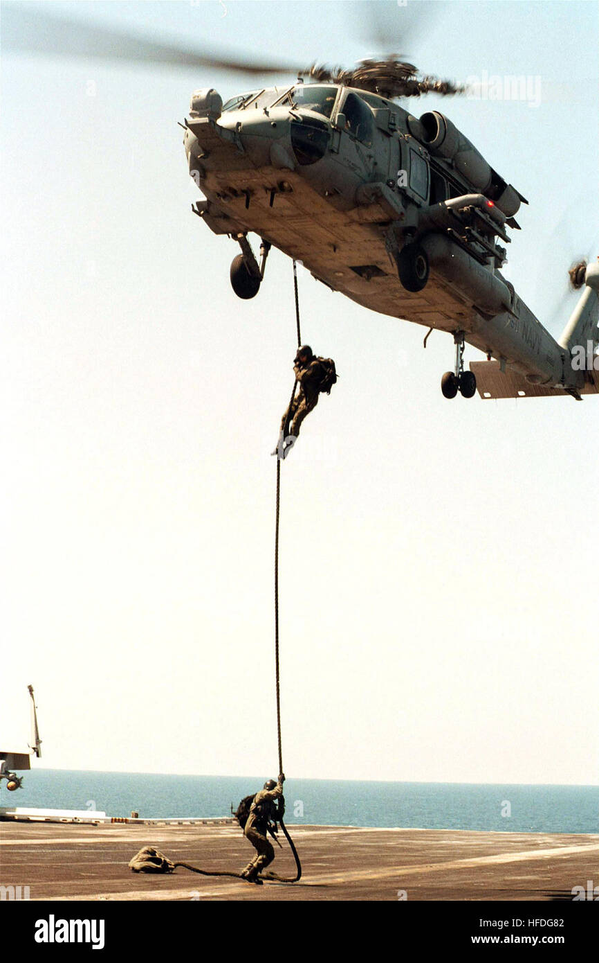Explosive Ordnance Disposal (EOD) team members aboard USS Theodore ...