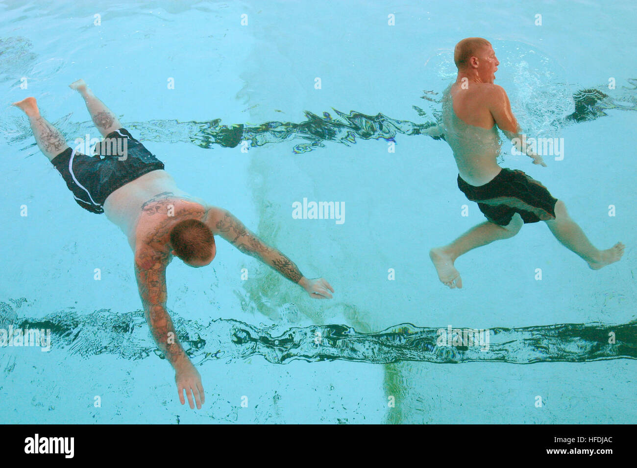 Pearl Harbor sailors perform prone float techniques to qualify as 2nd ...
