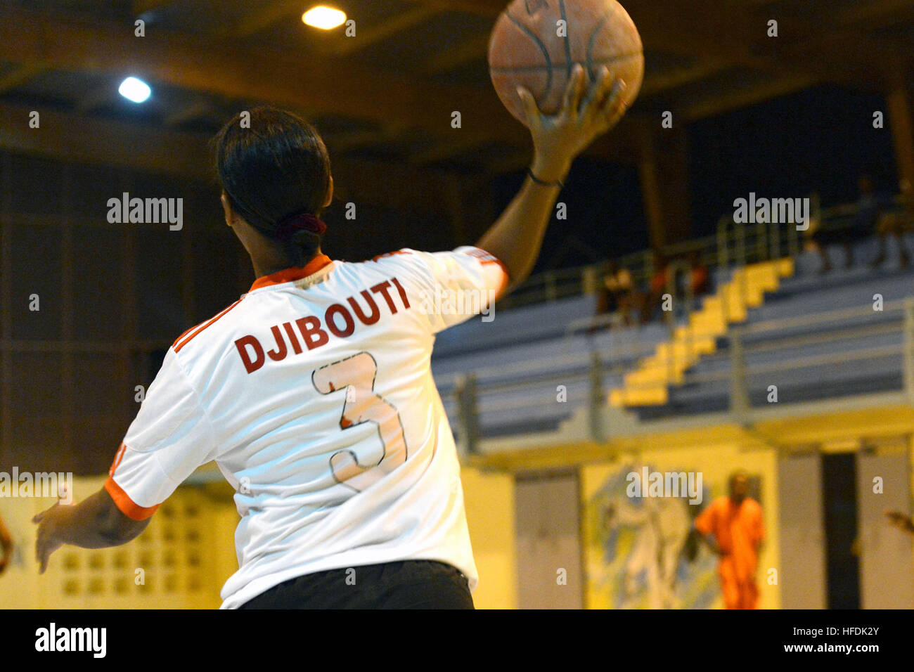 A Djiboutian player launches a inbound pass during a basketball game