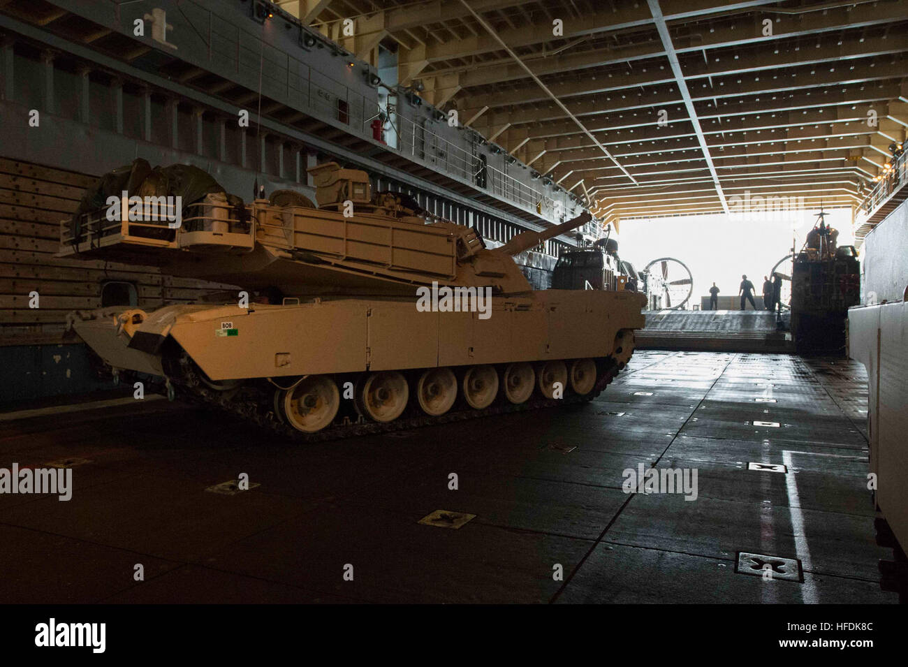 140403-N-BB269-395 SEA OF JAPAN (April 4, 2014) – A M1A1 Main Battle Tank maneuvers towards a landing craft air cushion (LCAC) in the well deck of Whidbey Island-class amphibious dock landing ship USS Ashland (LSD 48) for transport. Ashland is assigned to Expeditionary Strike Group Seven and is participating in Exercise Ssang Yong, an annual combined exercise conducted by Navy and Marine forces with the Republic of Korea in order to strengthen interoperability across the range of military operations. (U.S. Navy photo by Mass Communication Specialist Seaman Raymond D. Diaz III/Released) Amphibi Stock Photo