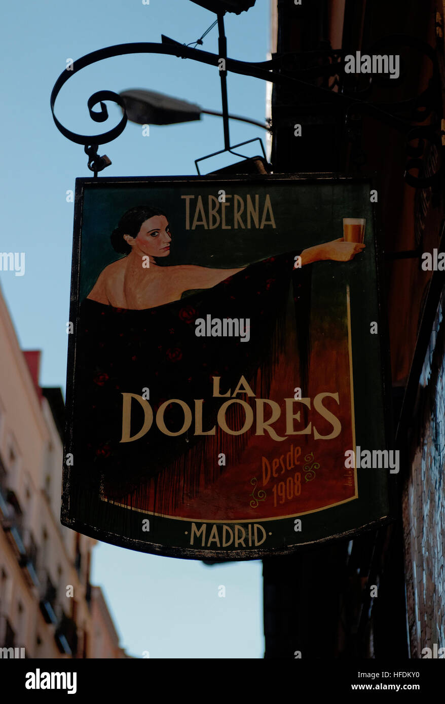Hanging bar sign for La Dolores Taberna in Madrid Spain Stock Photo